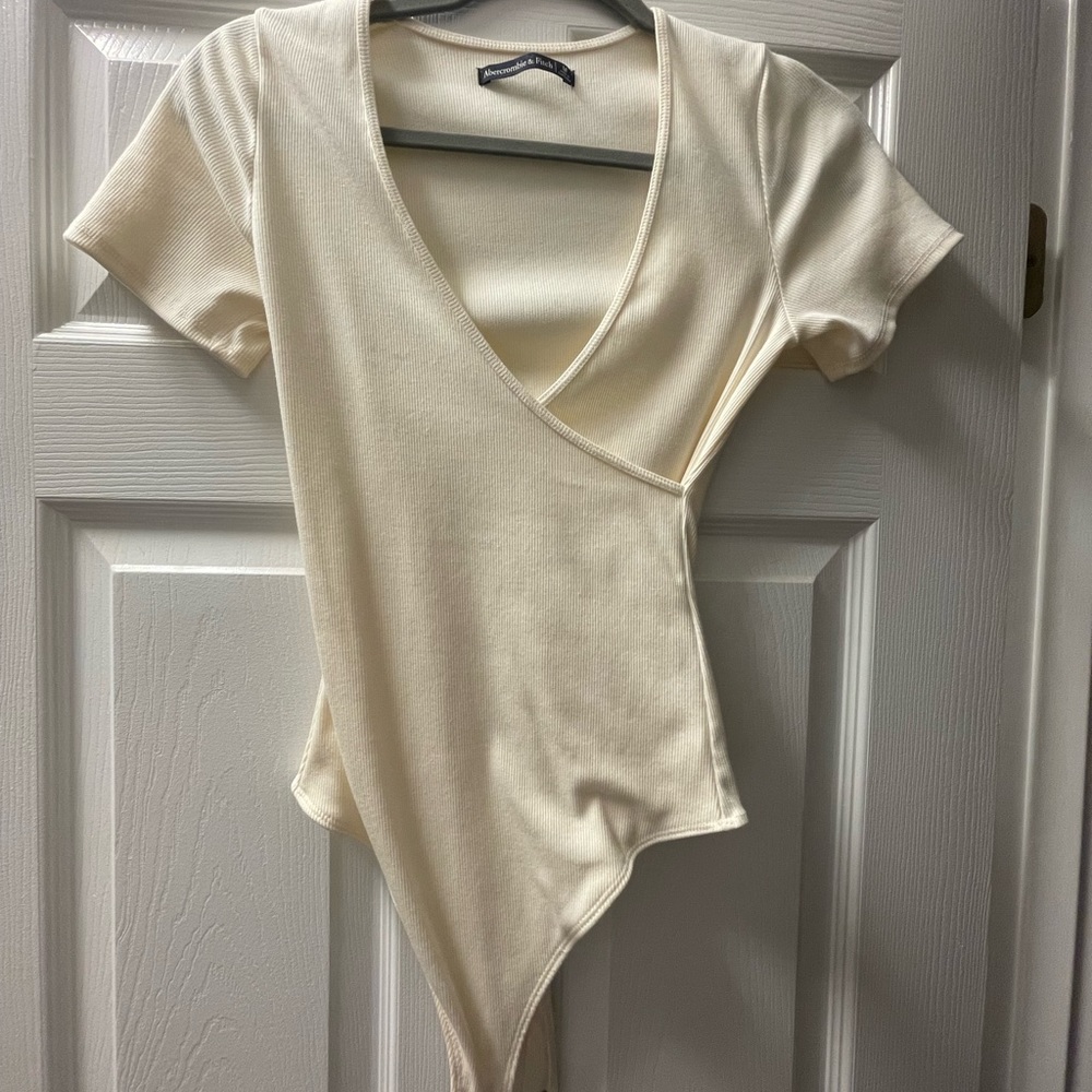 Cream body suit